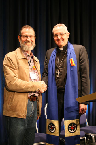 President-elect Stuart McMillan is congratulated by President Rev Prof Andrew Dutney