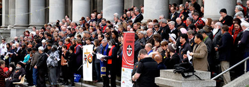Members of the 13th Assembly gather on the steps of the South Australian Parliament to hold a prayer vigil of lament for the Stronger Futures legislation