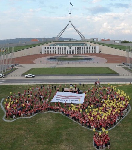 Anti-poverty advocates gather on the front lawns of Parliament House in Canberra in March to launch the Movement to End Poverty petition. Photo: Micah Challenge Australia