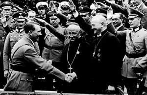 Adolf Hitler greets Reich Bishop Mueller and Abbot Schachleitner in a 1933 photo. From the website www.nobeliefs.com/nazis.htm