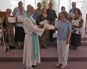 North Rockhampton Uniting Church Minister Rev Bernie Jarius presenting Olga Harris with her certificate