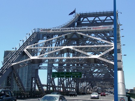 A banner tells Pancake Day tale on the Story Bridge