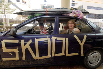 Arriving at the Gold Coast for Schoolies in 2006 are Thomas Chadwick (driver), Graham Rigley (white hat) and Nathan Dabicich, all 17, from Redcliffe.  Photo by Newspix / Riley Paul 