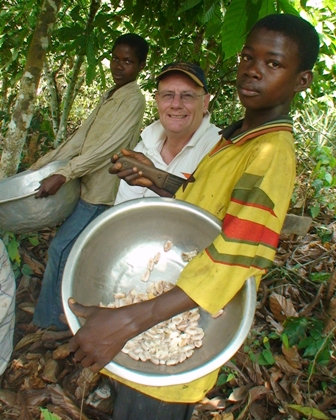 Rev Tim Costello in Ghana with cocoa workers (from left) Cynthia (14) and Louis (15).