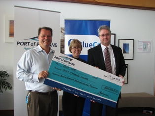 Blue Care Brisbane Regional Director Jon Campbell accepts a cheque from Port of Brisbane Corporation Chief Executive Officer Jeff Coleman. The money will be used to fund a health and wellness program for the Bayside community.