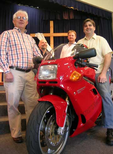 Flowers are nice, but décor by Ducati adds Italian flare. Greg Trost, Barry Wilson, Andrew Krosch and Malcolm James helped prepare and present ‘Adventure Faith’, a Sunday service prepared by the Pine Rivers Uniting Church men that packed the church in July. Photo by Phil Smith