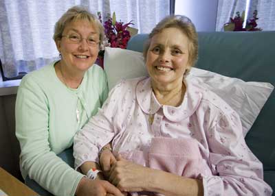 Wesley Hospital palliative care chaplain Linda McWilliam with patient Margaret Chapman. Photo by Osker Lau