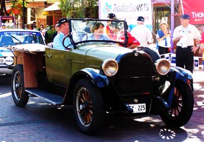 Behind the wheel is Patrol Minister, John Boundy and Frontier Services National Director, Rosemary Young. The vehicle which is a replica of the 1920s Dodge driven by John Flynn led off the Red Centre to Gold Coast Car Rally from Alice Springs on September 10. Photo courtesy of Greta Howard and Frontier Services