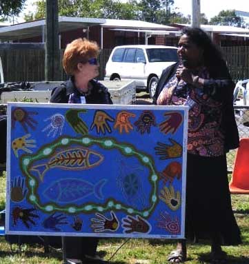 Beth Baker and painter Una Kanji with the artwork for Blackwater Uniting Church. Photo by Lisa Hodge