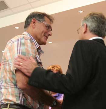 The Moderator Rev Bruce Johnson (right) welcomes newly ordained minister Rev Bruce Raymond