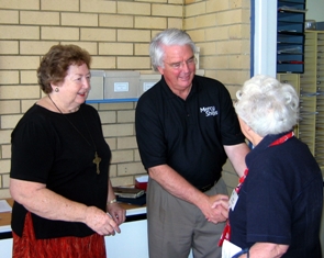 Rev Barbara Bailey and Don Stephens greeting a congregation member following the service.