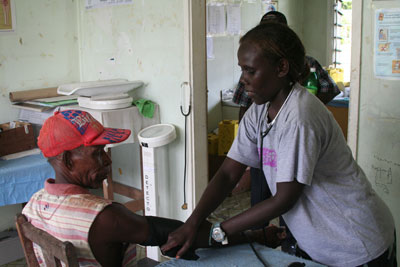 Solomon Islands nurse Maureen works with assistance from the Lent Event. Photo courtesy of Bruce Mullan and UnitingWorld