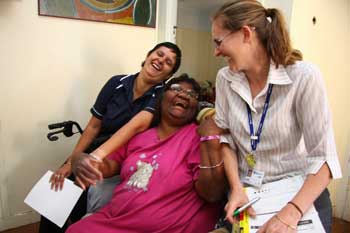 From left: Blue Care Northside Indigenous Care Coordinator Shannean Mawn, client Barbara Bundle and Blue Care Occupational Therapist Luisa Duplancic share a laugh during a community care visit to Barbara’s home.