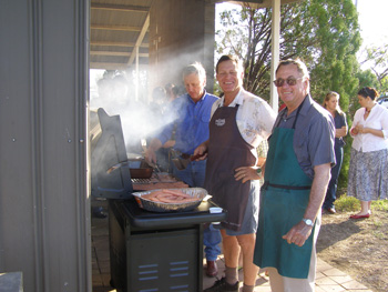 Joe Johnstone, John Eden, Rod Brumpton cooking up a Father’s Day feast. Photo by Peter Taubner