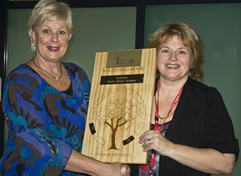 Director of Eden in Oz and NZ (EiON) Cathy Meyer (left) hands Parkview Director of Nursing Annie Gibney the official plaque. Photo by Aileen Wallace