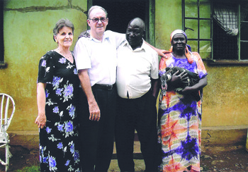 Lil and Peter Dyba with church members in Kenya. Photo courtesy of Peter Dyba