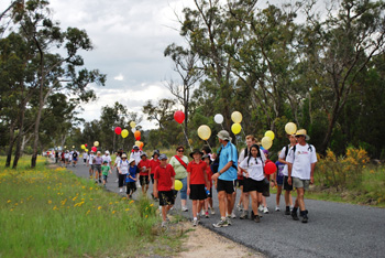 David Carnell, Andrew Carnell, Andrew Sav and supporters finish The 2000 Walk. Photo courtesy of Karyn Markwell