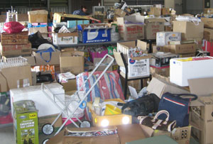 In Theodore 10 SES people are sorting through donations that fill a huge shed. Photo by Karyl Davison
