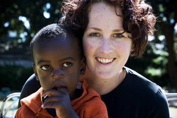 Katie Wallis with Caleb, an abandoned baby living in Iisaiah’s home of love, one of the projects Ms Wallis’ band Remember Seven supports. Photo by Joy Stovall
