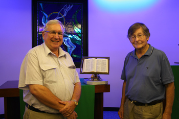 Mr Peter Slaughter (left) and Dr Tony Milne with the Bible stand. Photo courtesy of the Wesley Hospital 