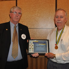 Dr Paul Inglis (right) receives his award. Photo courtesy of Wendy Keeble.