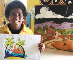 Andrew Williams with his winning artwork for the 2008 U.C.I.S calendar. Photo courtesy of Jane Moad