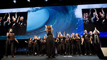 The Transformers choir performs with Deborah Conway at the Happiness and its Causes conference in Brisbane in June. Photo by Brendan Read
