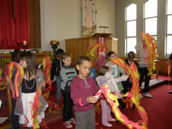 Children enjoy the Coorparoo Uniting Church 125th birthday celebrations. Photo courtesy of Des Hall