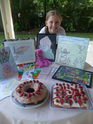Emma Irvine-Collins at her Haiti stall. Photo by Lesley Irvine