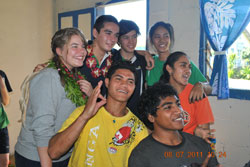 Unity College students with new friends from Peteli Middle School in Tonga. Photo by Phil Smith