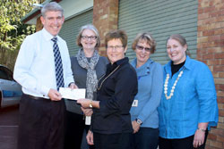 Blue Care Executive Director, Robyn Batten, accepts a cheque from The John Thomas Wilson Endowment from Perpetual General Manager, Philanthropy, Andrew Thomas, alongside Ashgrove manager, Caroline McCormack, Blue Care Community Support Officer, Debbie Gibbons, and Blue Care Brisbane Community Care Manager, Cathy Thomas. Photo courtesy of Blue Care