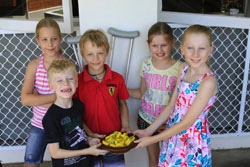 Townsville Central City Mission Sunday School children with some of the caps already collected. Photo by Sally Hall