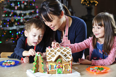 A family decorates together. Stock image 