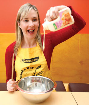 Comedienne Corinne Grant (Rove Live, the Glasshouse) gets ready for Pancake Day. Photo courtesy of UnitingCare