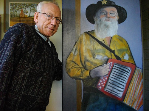 Ron Potter with Music Man, a painting refl ecting his experience of spirit, life and wonder. Photo courtesy of Ron Potter