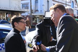 UnitingJustice National Director Rev Elenie Poulos speaks to Channel Ten reporter Hugh Riminton outside Balmain Town Hall