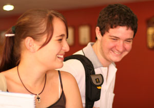 Ministry trainees Monique Mawbey and Gavin Core share a joke while attending training programs 