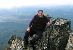 Rev Paul Chalson relaxing on the summit of Mt Anne, Tasmania. Photo by Grant Finlay