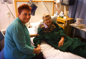 Wesley Hospital Chaplain Ms Terrie Seymour visiting patient Mrs Olive Cullen from Indooroopilly Uniting Church congregation during her time in hospital. Photo by Osker Lau