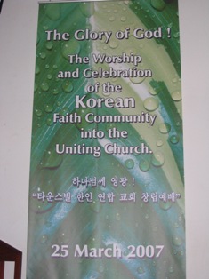 A banner welcomes the new Korean congregation
