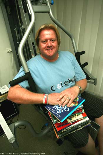 Andrew Fox relaxes on his home gym equipment prize. Photo by Kari Bourne, of the Sunshine Coast Daily