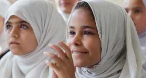 Adela, a nine-year-old Afghan girl in class at Charbagh-E-Safa Girls High School in Jalalabad. Photo by Act for Peace