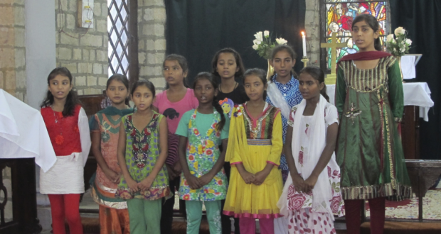 Girls singing at St James' Church of North India, Kangra. Photo taken by Frances Guard.
