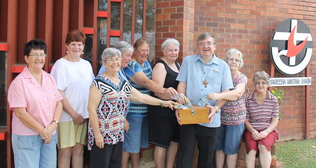 Rev Peter Blauw with members of Mareeba Uniting Church