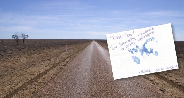 Photo of dry land in the Australian Outback with a thank you card from a farming family.